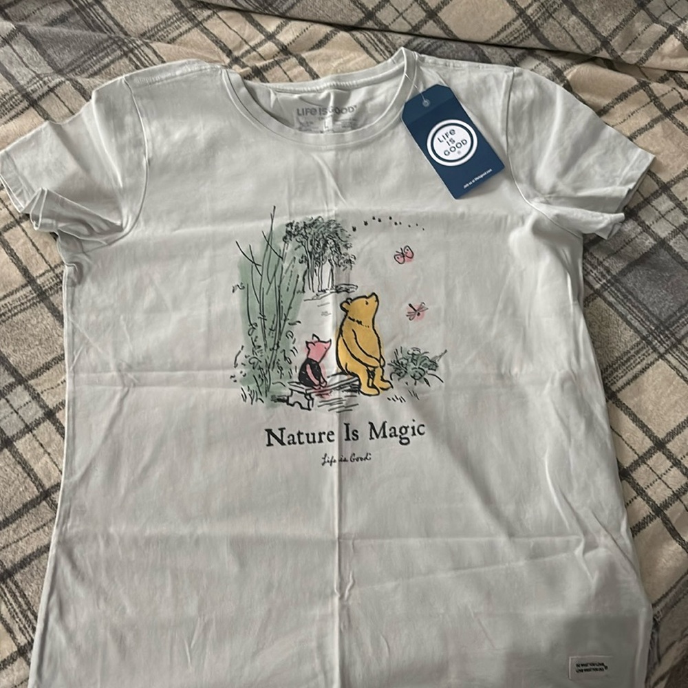 Size large life is good Winnie the Pooh shirt. Never worn.